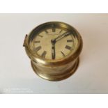 Brass ship's clock { 18cm Dia. X 10cm D }.