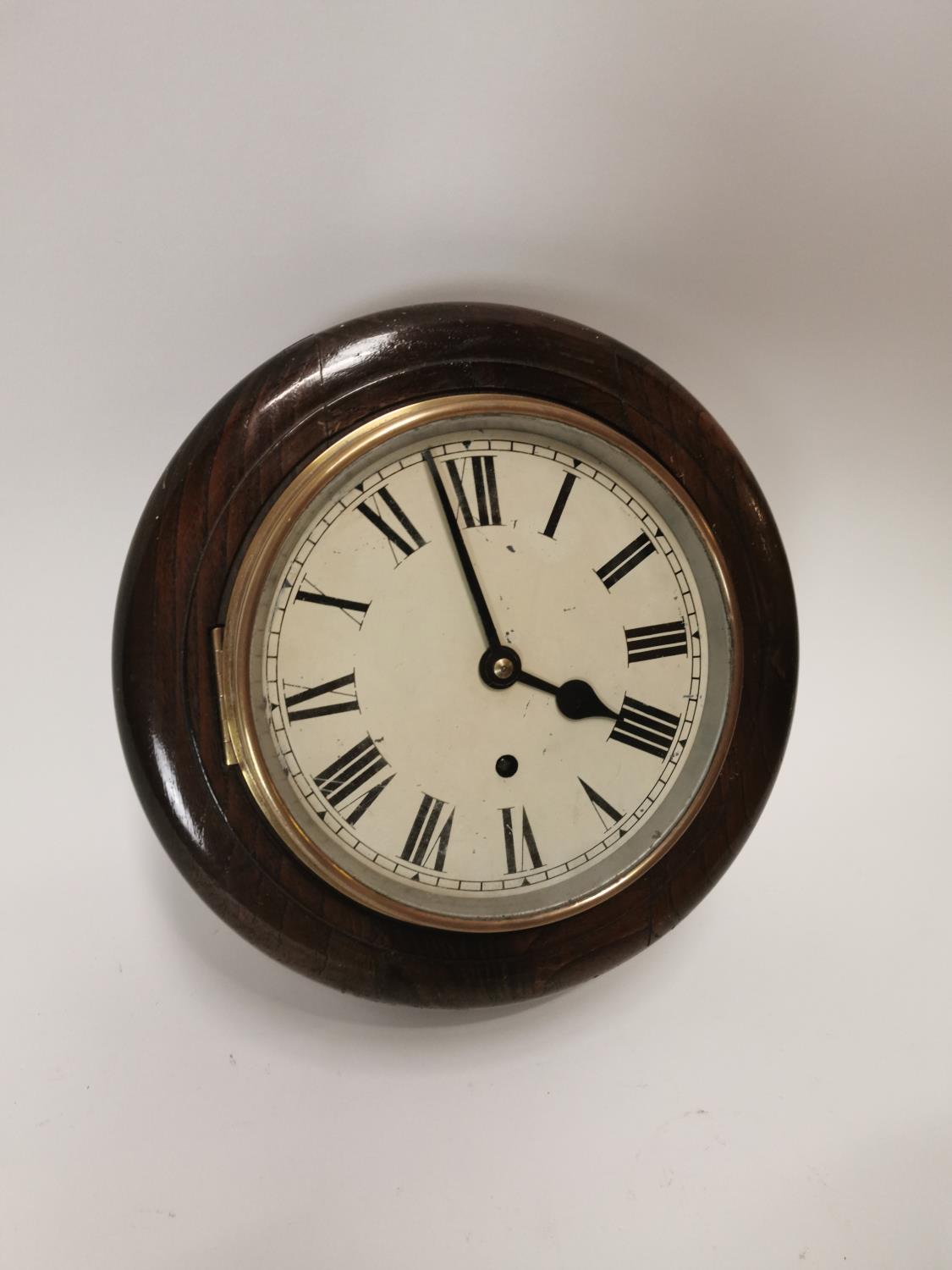 19th C. oak station clock with painted dial {29 cm Dia. x 14 cm D}.