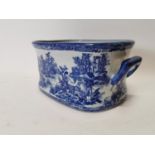 Decorative ceramic blue and white footbath {22 cm H x 48 cm W x 32 cm D}.