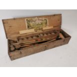 Early 20th C. croquet set in original pine box {18 cm H x 101 cm W x 28 cm D}.