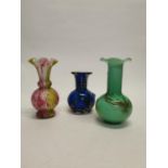 Three early 20th C. end of day glass flower vases {20 cm H, 19 cm H and 15 cm H}.