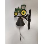 John Deere wall bell {40 cm H x 24 cm W}.