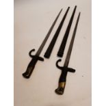Two 19th. C. French bayonets with original scabbards. {56 cm L}