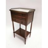 19th C. mahogany bed side cabinet with three drawers and marble top surrounded by brass gallery {76