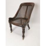 Regency mahogany chair with berger seat on fluted legs and brass casters {93 cm H x 56 cm W x 70 cm