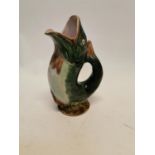 Juggling water jug in the form of a fish {27 cm H x 16 cm W x 11 cm D}.