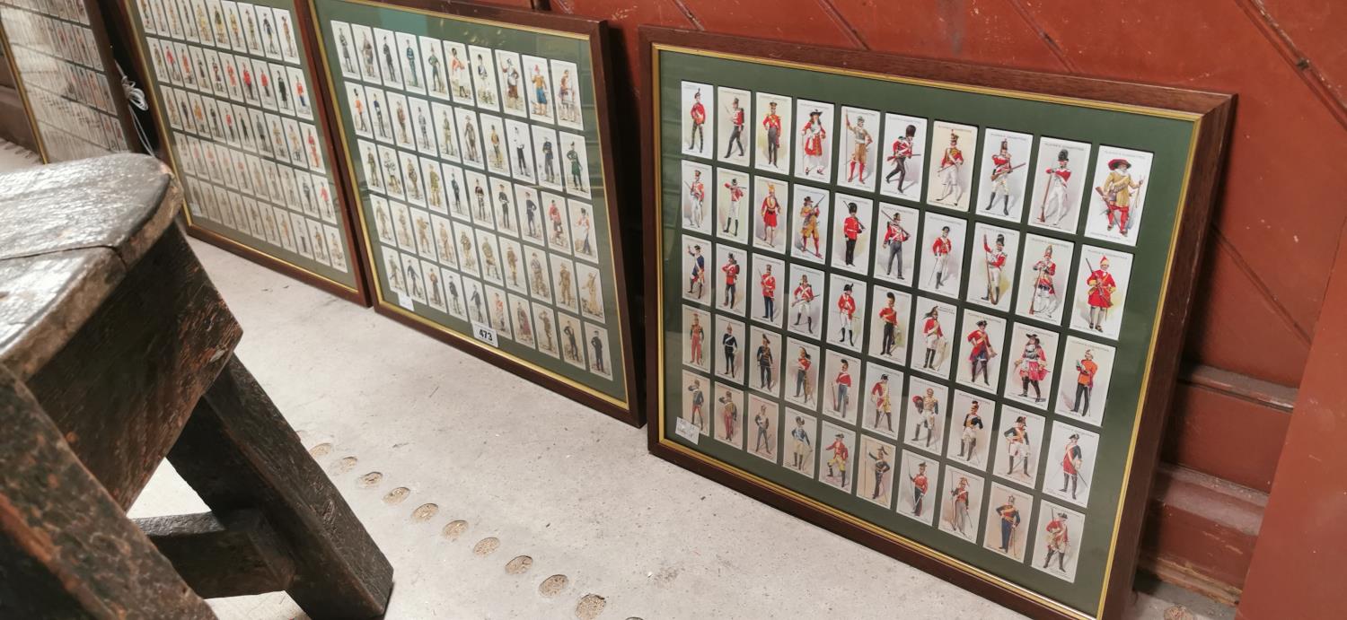 Set of four framed cigarette card collections .