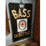 Bass In Bottle slate advertisement.