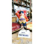 Truman's beer advertising figure.