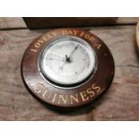 Guinness oak advertising barometer.