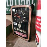 Guinness battery clock.