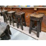 Set of four early 20th C. painted pine bar counter stools