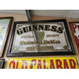 Guinness Extra Stout advertising mirror.