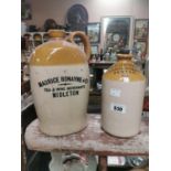 Two stoneware whiskey flagons.