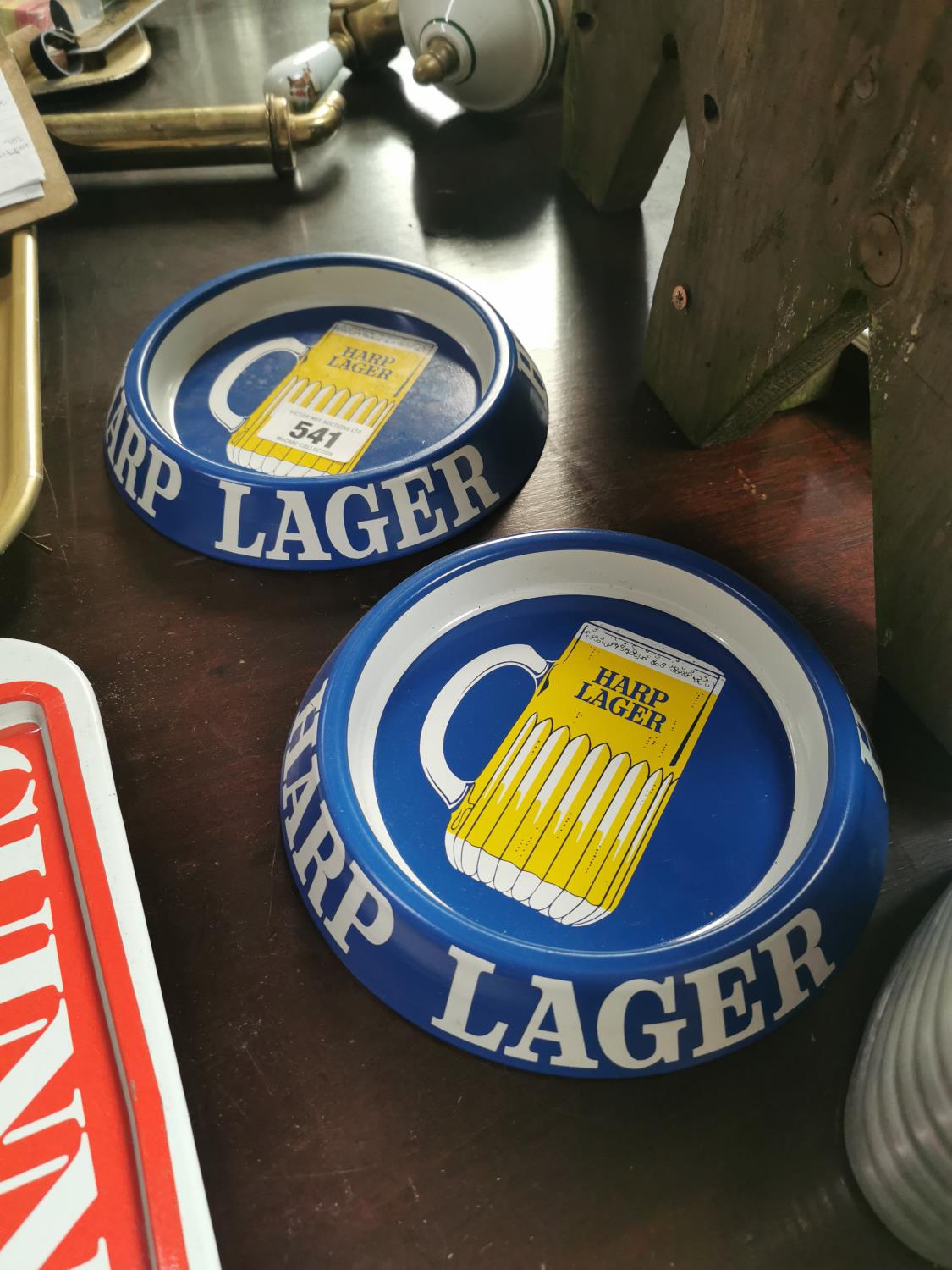 Two Harp Lager tinplate ashtrays