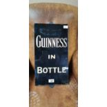 Guinness In A Bottle slate advertisement.