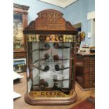 Rare early 20th C. mahogany The CIVIC Pipes advertising display cabinet.