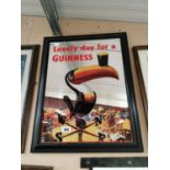 Lovely Day For A Guinness advertising mirror.