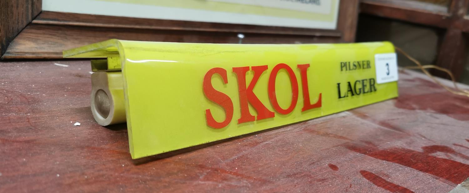 Skol Lager advertising shelf light.