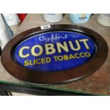 Ogden's Cobnut Slice Tobacco advertising sign.