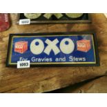 Oxo reverse painted glass advertisement.