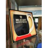 Draught Guinness Perspex advertising sign.