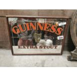 Guinness advertising mirror.