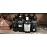 Collection of sixteen 1950's & 60's Gordon's Gin bottles { empty. }