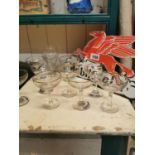 Collection of twenty four Babycham glasses.