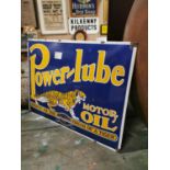 Power Lube Motor Oil advertising sign.