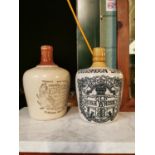 Two advertising stoneware flagons.