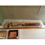 Guinness painted wooden advertising sign.
