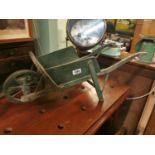 Early 20th. C. child's wooden wheel barrow.