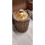Power's Whiskey stoneware flagon in original basket.