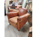 1930's leather upholstered club chair.