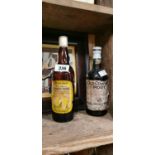 Bottle of Old Company Port and bottle of un alcoholic Ginger Wine