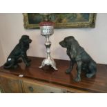 Pair of bronze models of seated dogs