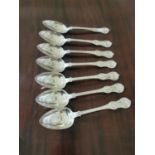 Set of seven English silver spoons 604 grams.