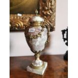 Rouge marble urn with ormulo mounts.