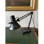 Angle poise desk lamp.