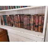 Collection of twenty one leather bound books