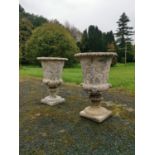 Pair of composition urns in the Georgian style.