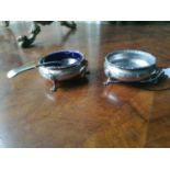 Two English silver salts and a mustard spoon.