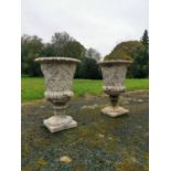 Pair of composition urns in the Georgian style.