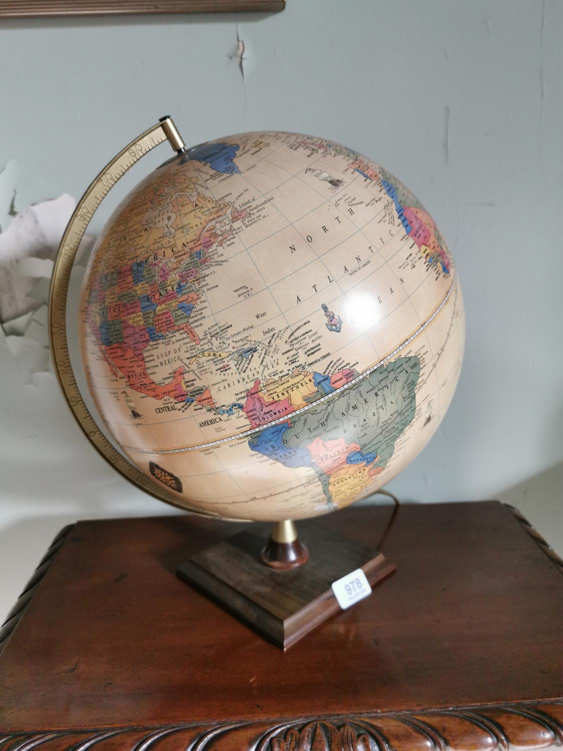 World globe on brass stand
