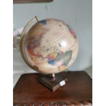 World globe on brass stand