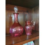 19th. C. ruby glass decanter and jug.