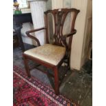 Georgian mahogany upholstered open armchair