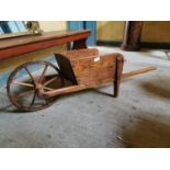 Early 19th. C. pine child's wheelbarrow.