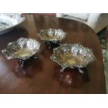 Three English silver bonbon dishes .